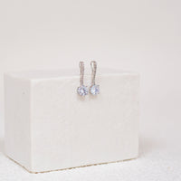 3.0 CTTW Synthetic Sapphire Clear Drop Rhodium Plated Earrings