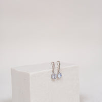 3.0 CTTW Synthetic Sapphire Clear Drop Rhodium Plated Earrings